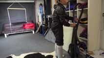 Watch Sandra cleaning the Studio wearing shiny nylon Rainwear and white Rubberboots