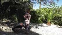  Zonah Bellum hogtied in the backyard