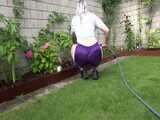 Get a video with Chloe enjoying gardening in her shiny nylon Shorts