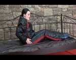 Jill putting on a sexy black downwear combination and blue rubber boots in an old cellar (Video)