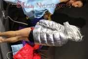 Watching sexy Stella and Sandra wearing a sexy shiny nylon shorts putting on several chiny nylon down jackets (Pics)