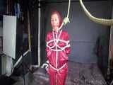 Watch Sandra bound gagged and noosed wearing her shiny nylon Rainwear