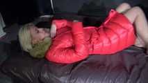 Watching sexy Pia puttng on a special red down jacket (Video)