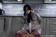 Miss Amira in AGU nylon rain gear and transparent rain suit gets bound and gagged hard