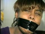 DEMETRIA GETS HER MOUTH STUFFED & WRAP GAGGED WITH ELECTRICAL TAPE (D27-15)