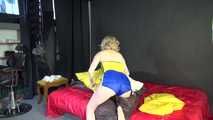 *** Sexy MIA wearing a blue shiny nylon shorts and a yellow top during changing the cloths on her bed  (Video)***