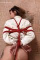 Maggie - strict hogtie on floor