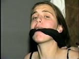 UK GIRL BALL-GAGGED, HANDS CABLE TIED, FEET & TOES RAWHIDE TIED (D31-11)