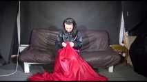 Watching Mara preparing her sofa with shiny nylon cloth wearing a sexy rainwear combination (Video)