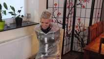 Miss Francine is bound and gagged in a nice short PVC dress covered with a transparent raincoat (extended version)