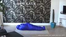 Mercy - being caught in the blue shiny nylon sleepingbag