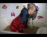 Mara wearing a sexy shiny nylon shorts and an odlschool rain jacket while taking a bath in mud (Video)