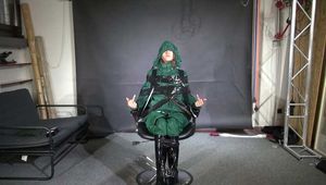 Marie M. taped and gagged in shiny nylon rainwear