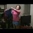 SEXY ENNI wearing a hot lightblue shiny nylon shorts and a pink shiny nylon rain jacket during sorting the cloths (Video)