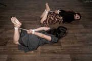 Capri and Zara in two Hogtied Barefoot