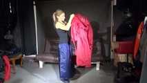 Watching sexy Sandra wearing a supersexy long rainwear skirt trying on several rain coats with hoods (Video)