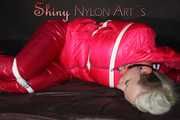 ***COURTNEY***NEW MODELL***being tied and gagged with ropes and a ballgag on a sofa wearing a pink rain pants and a pink doen jacket (Pics)