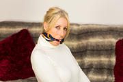 Bound and gagged in white