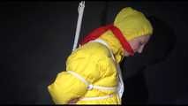 MARA tied and gagged overhead with ropes and a ballgag wearing a super sexy super shiny black rain pants, rubber boots and a yellow down jacket (Video)
