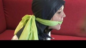 03:10 Min. video with Isabelle tied and gagged in shiny nylon clothes