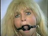BOMBSHELL TRACY GETS RING-GAGGED, SPONGE IN MOUTH, TAPE-GAGGED & CROTCH ROPED (D33-2)
