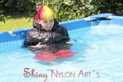 Mara sunbathing and swimming wearing supersexy crazy sensation shiny nylon downwear (Pics)