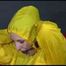 ***MARA*** ties and gagges with cuffs on the sofa wearing a supersexy oldschool yellow rain suit with hood (Video)