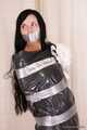 Marvita - Self mummified in trash bag