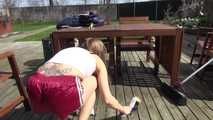 Watching sexy SANDRA wearing a supersexy special red shiny nylon shorts and a white top sweeping the terrace in the SUN enjoying the shiny weather (Video)