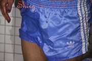 SEXY SANDRA in the shower with a sexy lightblue shiny nylon shorts and a top (Pics)