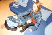 Stella tied and gagged by Leonie both wearing sexy shiny nylon rainwear (Pics)