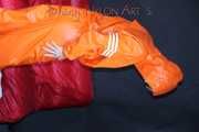 Watching Pia putting on a wonderful supersexy shiny nylon rainssuit in orange (Pics)