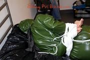 Pia tied and gagged by Sophie both wearing a shiny PVC sauna suit (Pics)