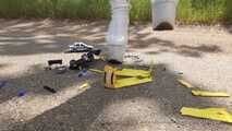 Model car crushing beside the motorway