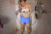 SEXY SANDRA in the shower with a sexy lightblue shiny nylon shorts and a top (Pics)