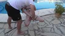 Submissiv British teen tied up next to the pool 