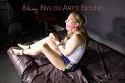 Sandra beeing tied and gagged by Stella in Shiny Nylon Shorts