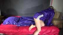 Sandra preparing her shiny nylon bed wearing sexy purple shiny nylon shorts and a purple shiny nylon rain jacket (Video)