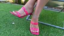 pink heels dangling
