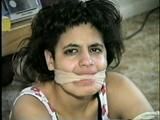 LATINA RING GAGGED, BALL-TIED, BLINDFOLDED, ACE BANDAGE GAGGED, TOE TIED & SPANKED (D32-12)