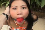 Video: Hot Evening Outside. Cute Asian Girl is Tied to the Chair Outside and Exposed for You.