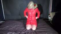 Watching sexy Pia puttng on a special red down jacket (Video)