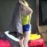 *** Sexy MIA wearing a blue shiny nylon shorts and a yellow top during changing the cloths on her bed  (Video)***