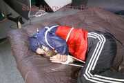 SANDRA tied, gagged and hooded with ropes on a bed wearing a supersexy oldschool rain jacket and a shiny nylon rain pants (Pics)
