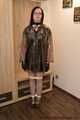 Gothic Girl bound in PVC dress and raincoat