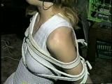 SEXY TERRI IS BALL-GAGGED, ACE BANDAGE GAGGED WHILE TIED TO CHAIR (D33-12)