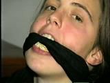 UK GIRL BALL-GAGGED, HANDS CABLE TIED, FEET & TOES RAWHIDE TIED (D31-11)