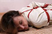 Maggie - strict hogtie on floor