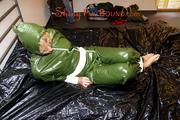 Pia tied and gagged by Sophie both wearing a shiny PVC sauna suit (Pics)