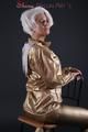 Blonde archive girl posing in a studio wearing a sexy golden rainwear combination (Pics)